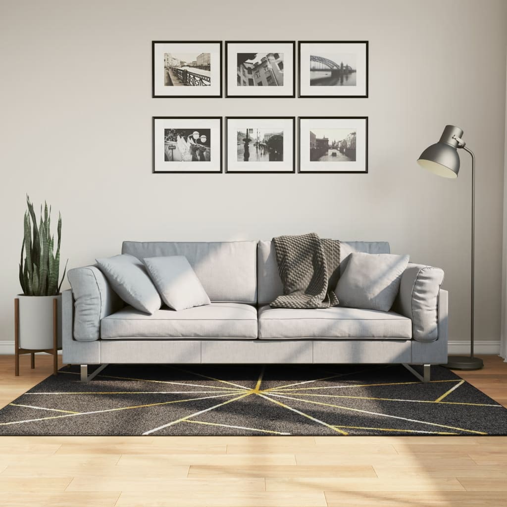 Tapete lavável 120x180 cm preto e dourado