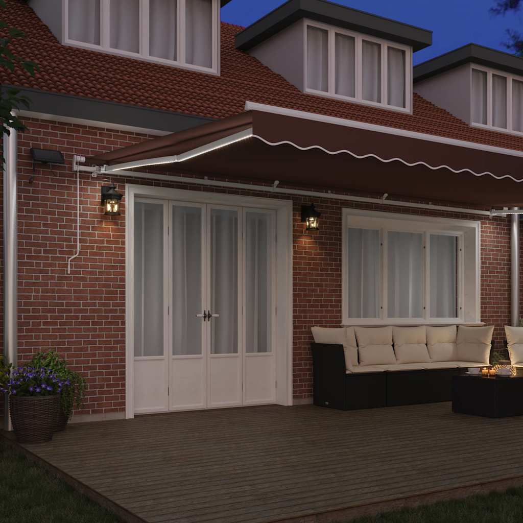 Toldo retrátil manual com luz LED 600x300 cm castanho