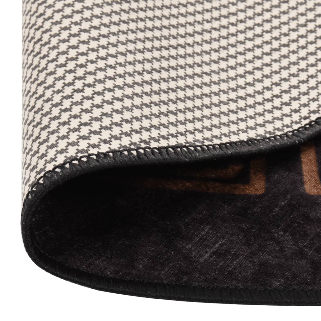 Tapete lavável ø 200 cm preto e dourado
