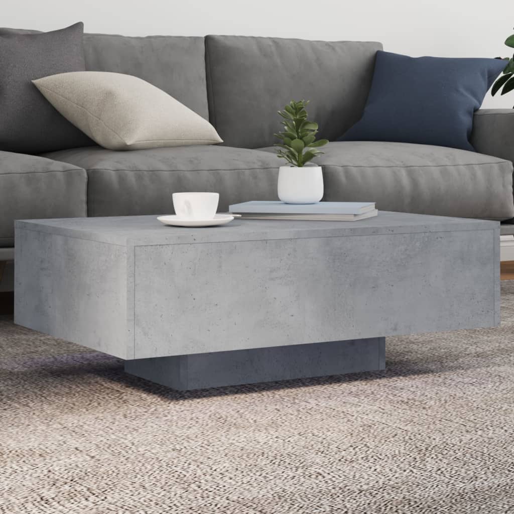 Mesa de centro com luzes LED 85x55x31 cm cinzento cimento