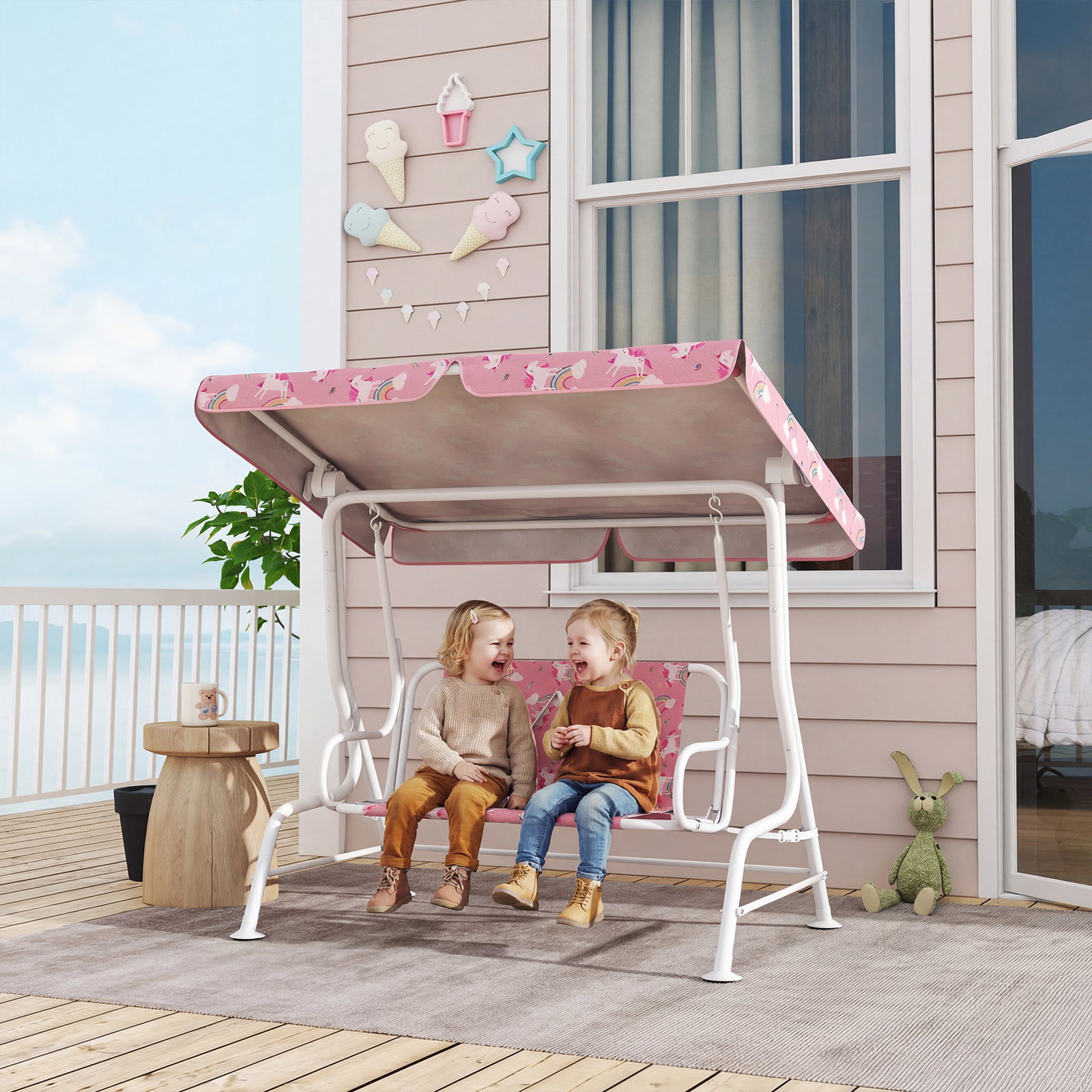 Baloiço de jardim exterior infantil de 2 lugares com toldo ajustável, cintos de segurança e design de unicórnio e arco-íris rosa