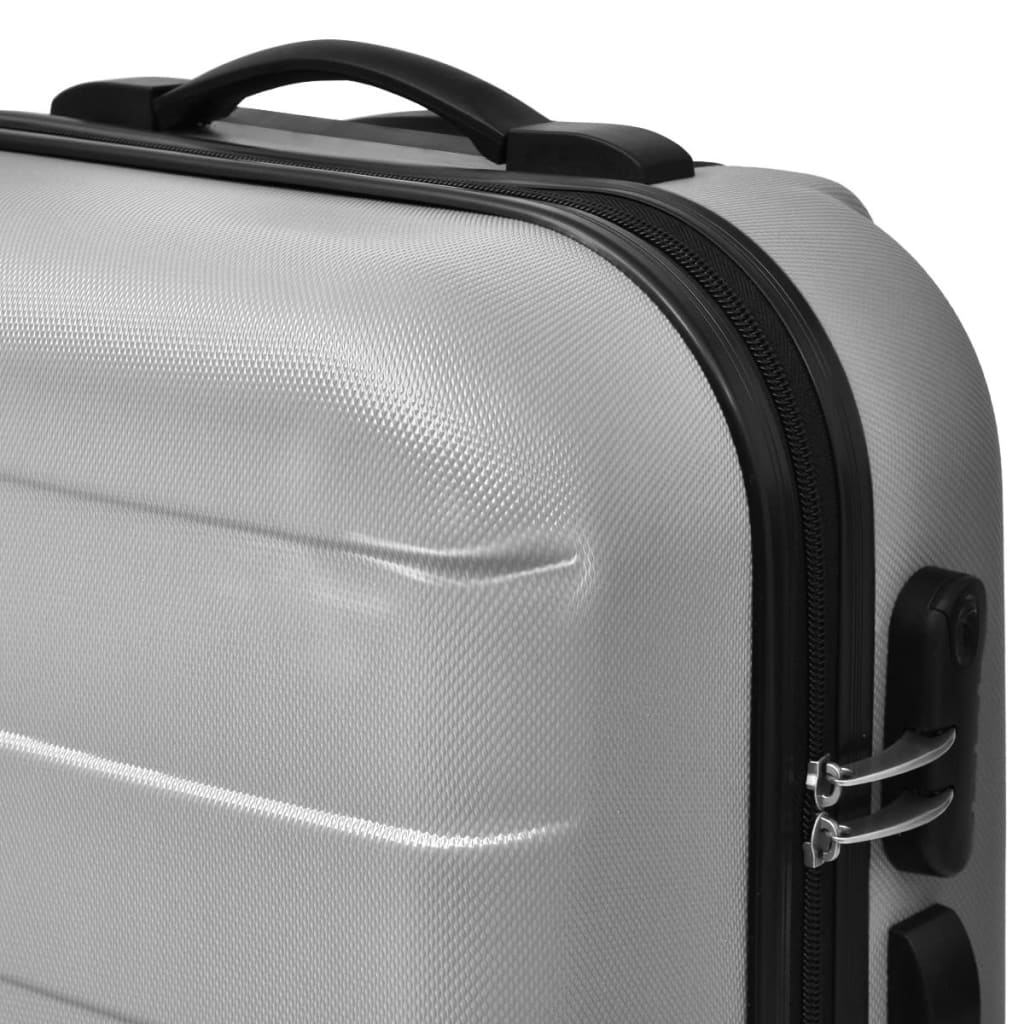 Conjunto de três trolleys rígidos, prateado