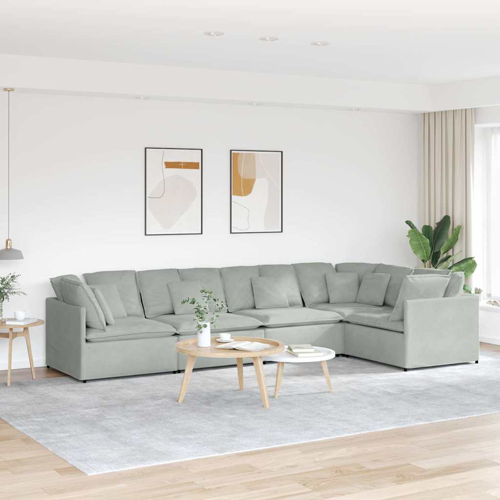 Sofá modular com almofadas em veludo cinza claro