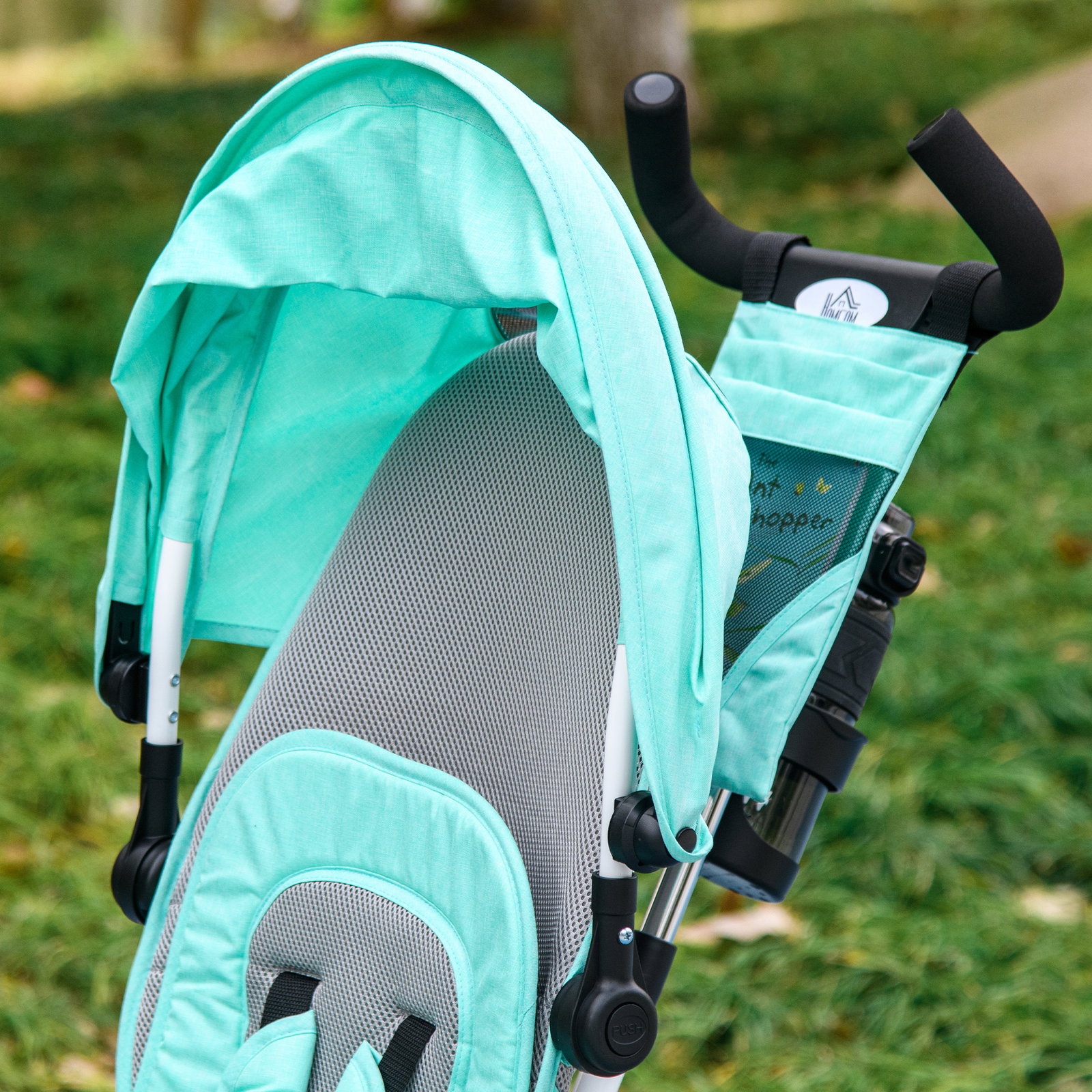 Triciclo para bebés 2 em 1 de +12 meses com capota dobrável guiador telescópico e removível bolsa e porta-garrafas verde água
